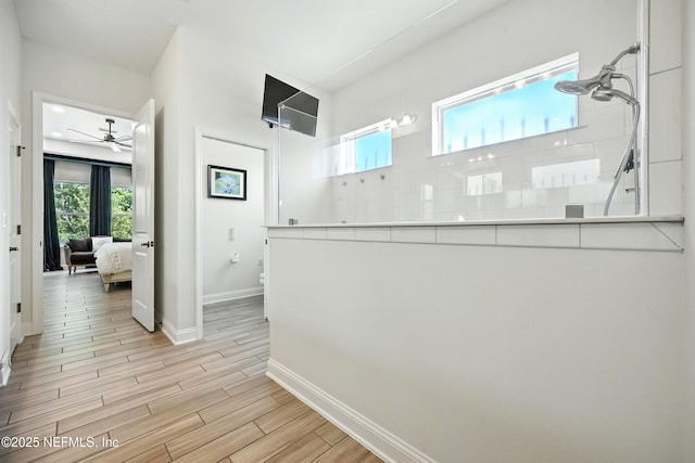 2919 Brettungar Dr, Jacksonville, FL 32224 - corridor featuring plenty of natural light and light wood-style flooring
