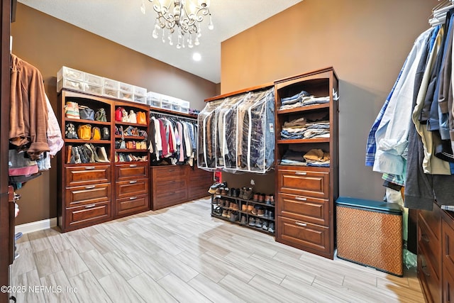 2919 Brettungar Dr, Jacksonville, FL 32224 - spacious closet with a chandelier and light wood-style flooring