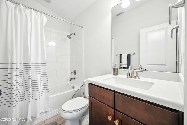 2919 Brettungar Dr, Jacksonville, FL 32224 - bathroom featuring vanity, shower / tub combo with curtain, wood finished floors, and vaulted ceiling