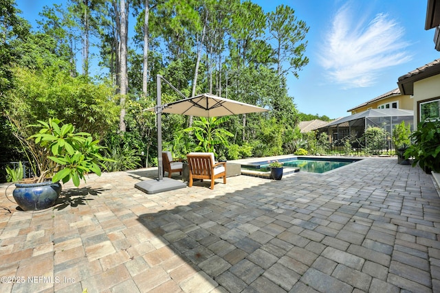 2919 Brettungar Dr, Jacksonville, FL 32224 - view of patio with an outdoor pool