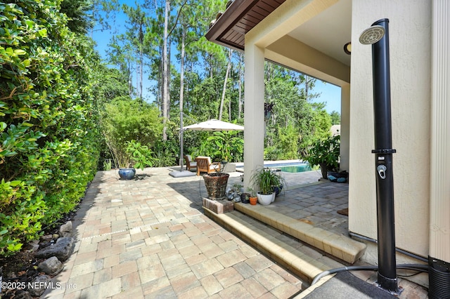 2919 Brettungar Dr, Jacksonville, FL 32224 - view of patio / terrace featuring an outdoor pool