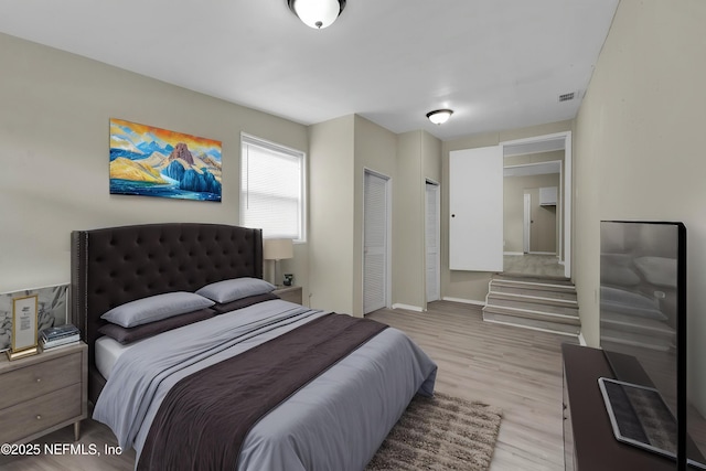 654 Woodbine St, Jacksonville, FL 32206 - bedroom with wood finished floors and baseboards