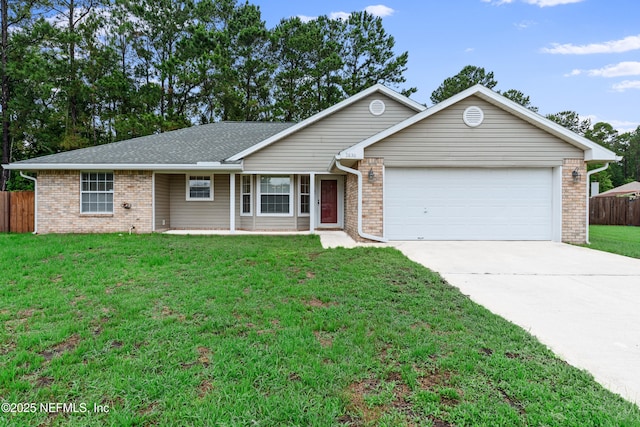 2830 Limestone Ct, Middleburg, FL 32068 - ranch-style house featuring driveway, an attached garage, and brick siding