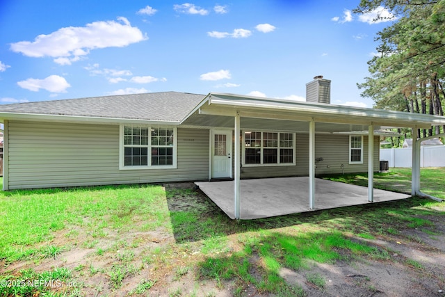 2830 Limestone Ct, Middleburg, FL 32068 - rear view of property featuring a patio and a chimney