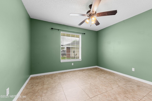 2830 Limestone Ct, Middleburg, FL 32068 - empty room featuring a textured ceiling, a ceiling fan, tile patterned flooring, and baseboards