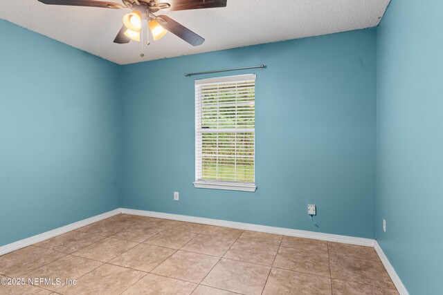 2830 Limestone Ct, Middleburg, FL 32068 - empty room featuring ceiling fan, tile patterned floors, baseboards, and a textured ceiling