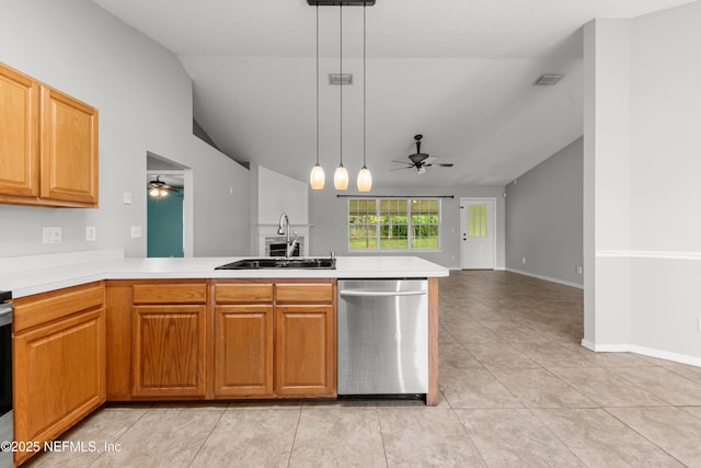 2830 Limestone Ct, Middleburg, FL 32068 - kitchen with stainless steel dishwasher, a sink, ceiling fan, lofted ceiling, and light tile patterned floors