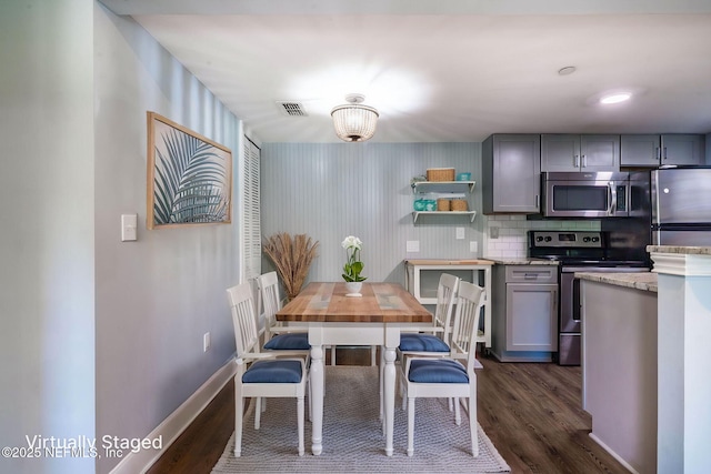 100 Fairway Park Blvd Unit 1306, Ponte Vedra Beach, FL 32082 - kitchen with appliances with stainless steel finishes, gray cabinetry, dark wood-style floors, and open shelves