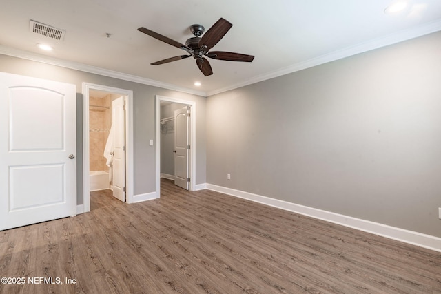 100 Fairway Park Blvd Unit 1306, Ponte Vedra Beach, FL 32082 - unfurnished bedroom with wood finished floors, baseboards, ornamental molding, recessed lighting, and a spacious closet