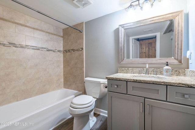 100 Fairway Park Blvd Unit 1306, Ponte Vedra Beach, FL 32082 - full bath featuring toilet, vanity, tub / shower combination, wood finished floors, and baseboards