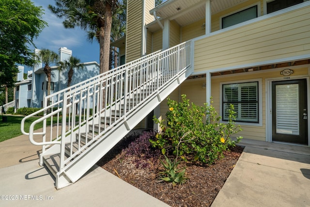 100 Fairway Park Blvd Unit 1306, Ponte Vedra Beach, FL 32082 - view of side of property featuring stairs and a chimney