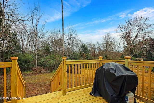1573 Aletha Dr, Jacksonville, FL 32211 - wooden deck with grilling area and view of scattered trees