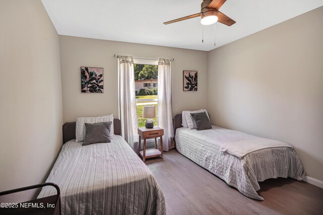 1573 Aletha Dr, Jacksonville, FL 32211 - bedroom with wood finished floors and ceiling fan