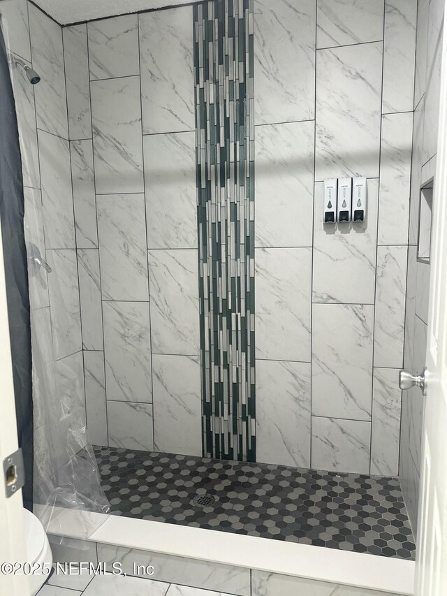 1573 Aletha Dr, Jacksonville, FL 32211 - full bath with a stall shower and toilet