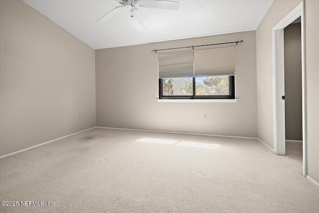 unfurnished bedroom with carpet flooring, baseboards, and a ceiling fan