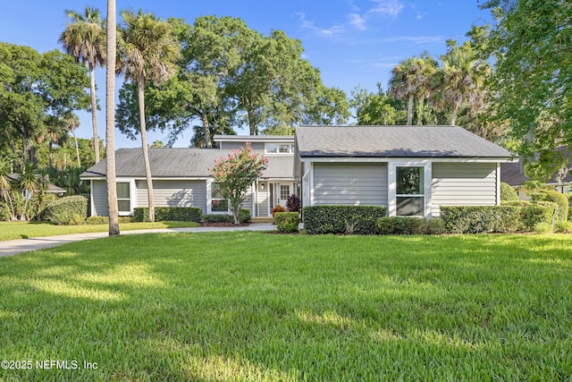 5105 Otter Creek Dr, Ponte Vedra Beach, FL 32082 - mid-century modern home featuring a front lawn