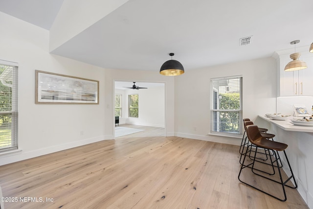 5105 Otter Creek Dr, Ponte Vedra Beach, FL 32082 - dining room with healthy amount of natural light, light wood finished floors, baseboards, and ceiling fan