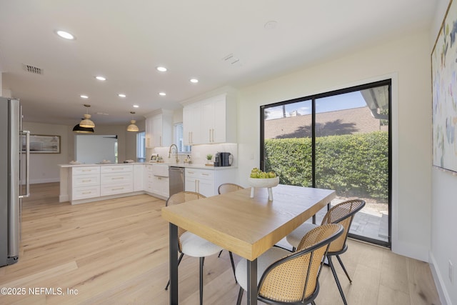 5105 Otter Creek Dr, Ponte Vedra Beach, FL 32082 - dining space featuring recessed lighting, light wood finished floors, and baseboards