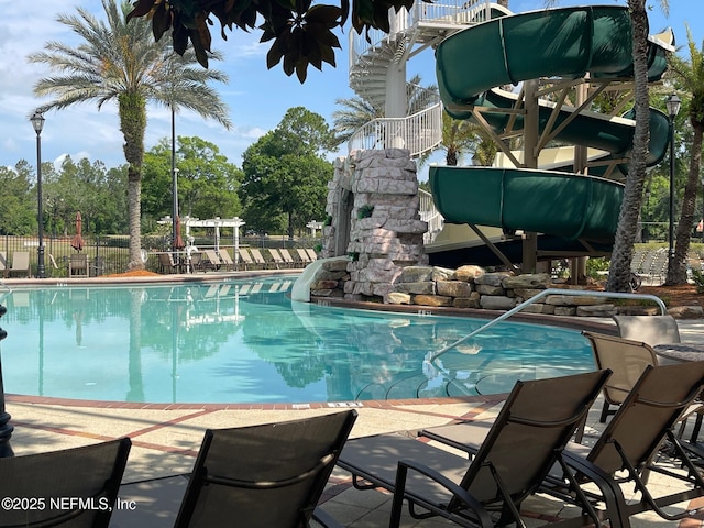 3931 Eagle Rock Rd, Middleburg, FL 32068 - community pool featuring fence and a water slide