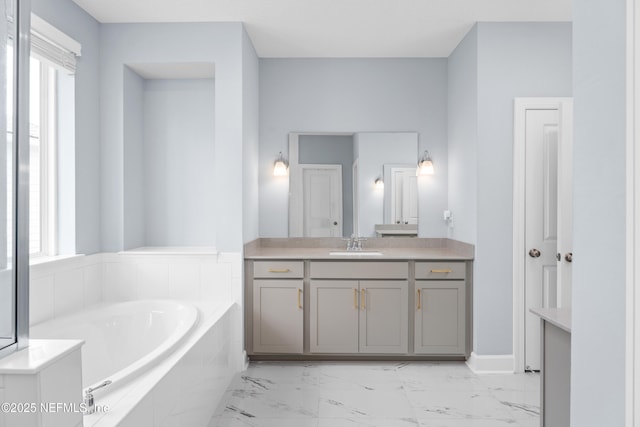 3931 Eagle Rock Rd, Middleburg, FL 32068 - bathroom with marble finish flooring, a bath, plenty of natural light, and vanity