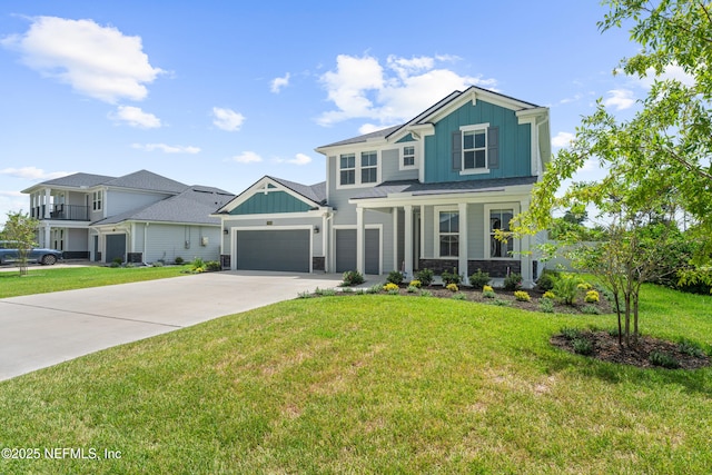 3931 Eagle Rock Rd, Middleburg, FL 32068 - view of front of house with board and batten siding, driveway, a front yard, and a garage