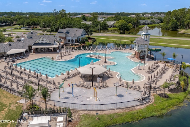 2120 Stone Creek Dr Unit E, Fleming Island, FL 32003 - community pool with a water view, view of scattered trees, and a water slide