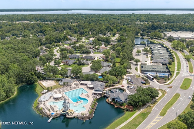 2120 Stone Creek Dr Unit E, Fleming Island, FL 32003 - drone / aerial view of a heavily wooded area, a large body of water, and a pool