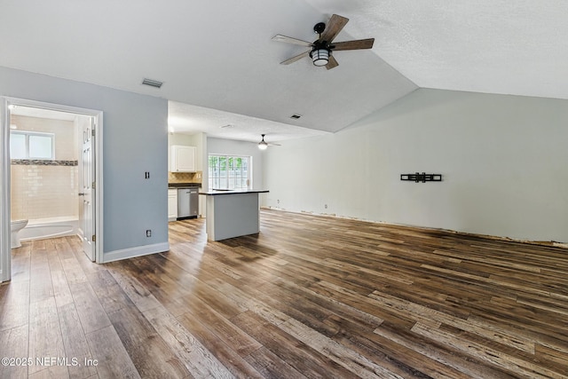 12613 Deeder Ln, Jacksonville, FL 32258 - unfurnished living room with a ceiling fan, dark wood-style flooring, and vaulted ceiling