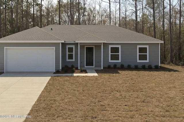 ranch-style house featuring a garage, driveway, a front yard, and a shingled roof