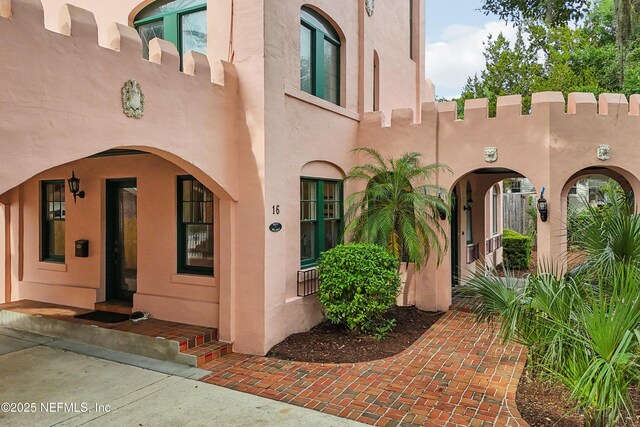16 May St, Saint Augustine, FL 32084 - view of home's exterior featuring stucco siding