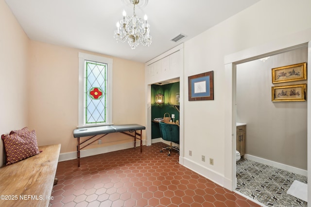 16 May St, Saint Augustine, FL 32084 - interior space featuring a chandelier and baseboards