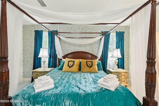 16 May St, Saint Augustine, FL 32084 - bedroom featuring wallpapered walls and baseboards