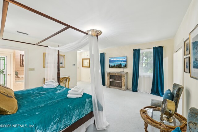 16 May St, Saint Augustine, FL 32084 - bedroom with ensuite bath and carpet floors
