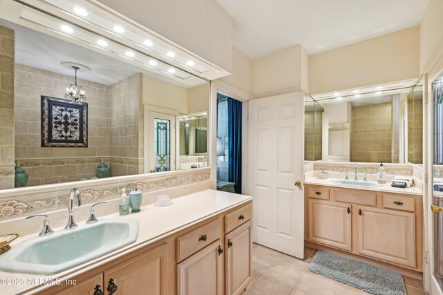 16 May St, Saint Augustine, FL 32084 - full bathroom with recessed lighting, tile patterned flooring, vanity, and a chandelier