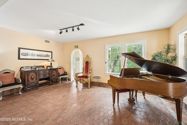 16 May St, Saint Augustine, FL 32084 - sitting room with arched walkways and rail lighting