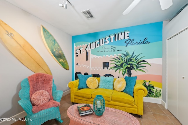 16 May St, Saint Augustine, FL 32084 - living area featuring tile patterned flooring, baseboards, and a ceiling fan