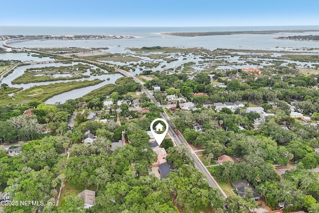16 May St, Saint Augustine, FL 32084 - aerial view of property's location with a large body of water and a tree filled landscape