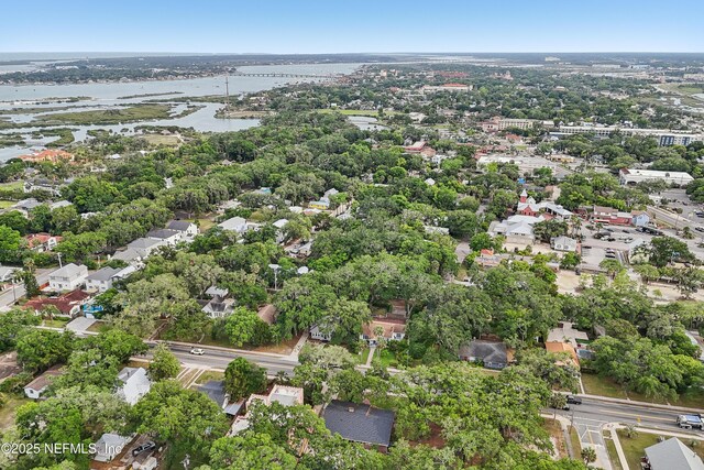 16 May St, Saint Augustine, FL 32084 - aerial perspective of suburban area with a nearby body of water and a tree filled landscape