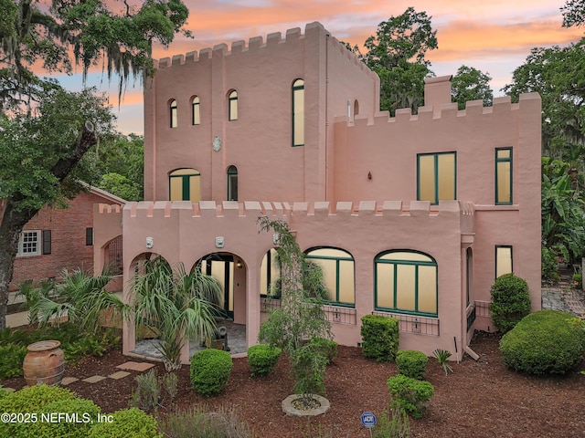 16 May St, Saint Augustine, FL 32084 - pueblo-style house with stucco siding