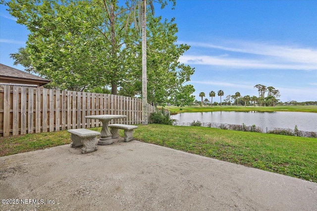 view of patio / terrace with a water view