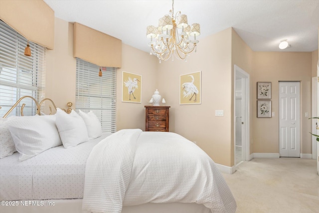 425 N Ocean Grande Dr Unit 205, Ponte Vedra Beach, FL 32082 - bedroom with light carpet, a chandelier, and baseboards
