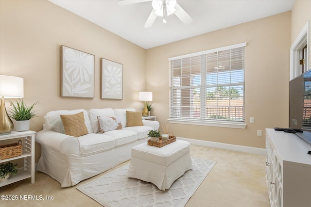 425 N Ocean Grande Dr Unit 205, Ponte Vedra Beach, FL 32082 - living room featuring a ceiling fan, light carpet, and baseboards
