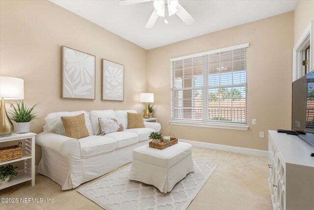 425 N Ocean Grande Dr Unit 205, Ponte Vedra Beach, FL 32082 - living area featuring ceiling fan, light colored carpet, and baseboards