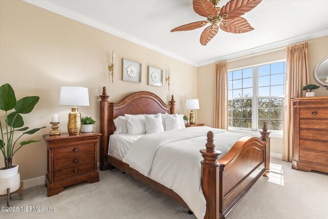 425 N Ocean Grande Dr Unit 205, Ponte Vedra Beach, FL 32082 - bedroom with light carpet, crown molding, baseboards, and a ceiling fan