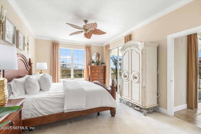 425 N Ocean Grande Dr Unit 205, Ponte Vedra Beach, FL 32082 - bedroom with ornamental molding, ceiling fan, light colored carpet, and baseboards