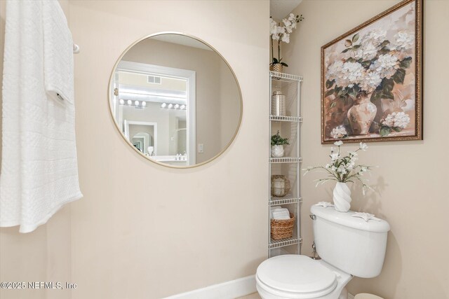425 N Ocean Grande Dr Unit 205, Ponte Vedra Beach, FL 32082 - bathroom with toilet and baseboards