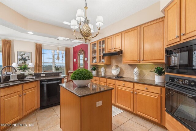 425 N Ocean Grande Dr Unit 205, Ponte Vedra Beach, FL 32082 - kitchen with black appliances, a chandelier, a sink, light tile patterned floors, and under cabinet range hood