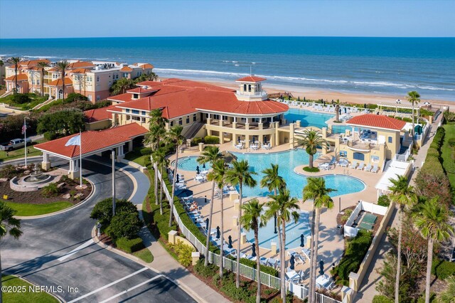 425 N Ocean Grande Dr Unit 205, Ponte Vedra Beach, FL 32082 - bird's eye view of a pool area and a nearby body of water