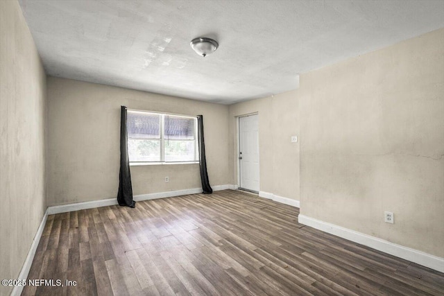 7972 Waxwing Ave, Jacksonville, FL 32219 - unfurnished room featuring wood finished floors and baseboards