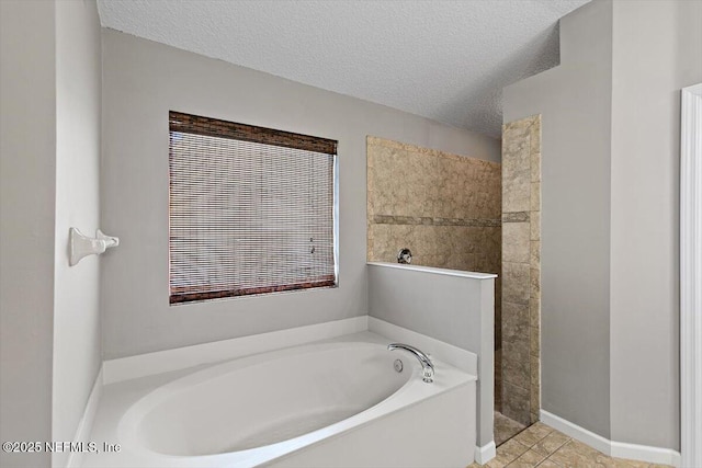 663 Reflection Cove Ct, Jacksonville, FL 32218 - full bath with a bath, a walk in shower, a textured ceiling, and tile patterned floors